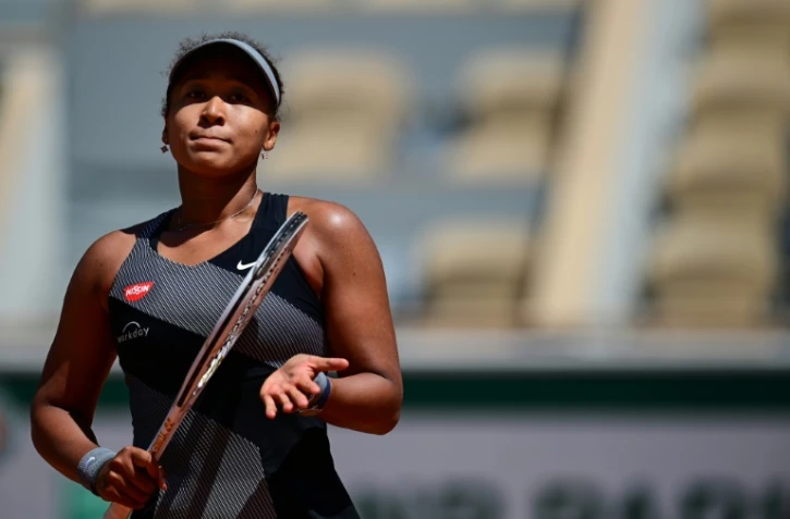 La Japonaise Naomi Osaka, après sa victoire, 6-4, 7-6 (7/4) face à la Roumaine Patricia Maria Tig, lors du 1er tour du tournoi de Roland Garros, le 30 mai 2021 à Paris