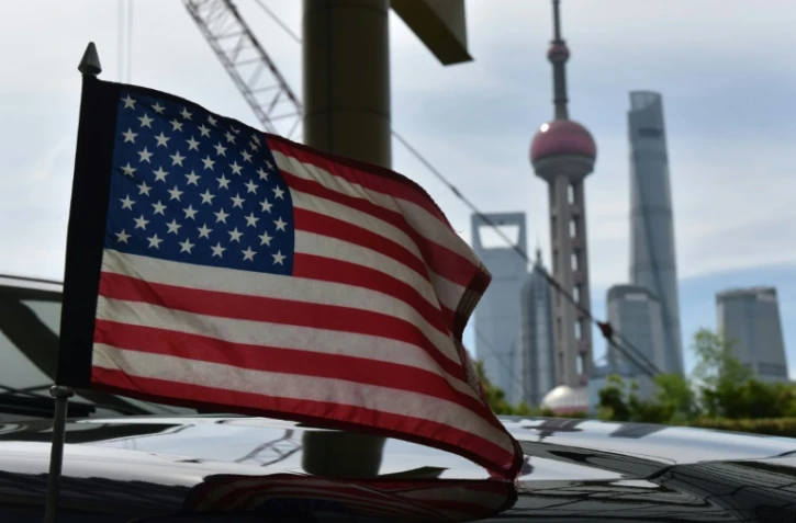 Le drapeau américain flotte sur un véhicule du consulat, en juillet 2019 à Shanghai