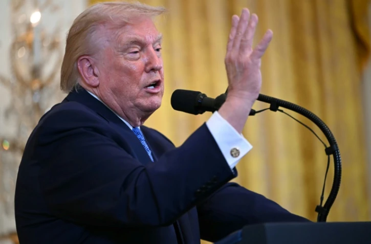 Le président américain Donald Trump s'exprime lors d'une réception de Hanouka, à la Maison Blanche à Washington, le 16 décembre 2025