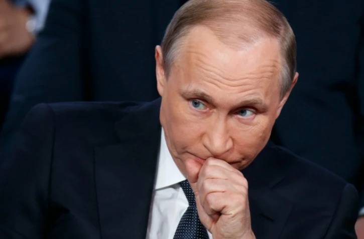 Le président russe Vladimi Poutine lors d'une conférence de presse à Saint-Pétersbourg, le 7 avril 2016