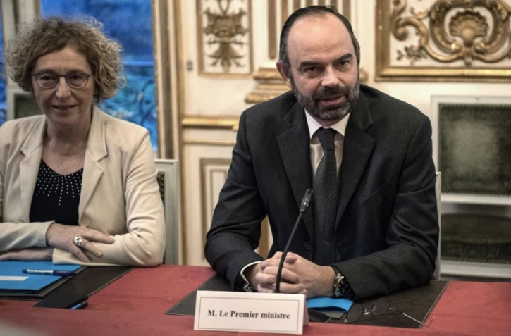 Le Premier ministre Edouard Philippe et la ministre du Travail Muriel Penicaud (G) lors d'une rencontre avec les syndicats Ă Matignon le 11 janvier 2019