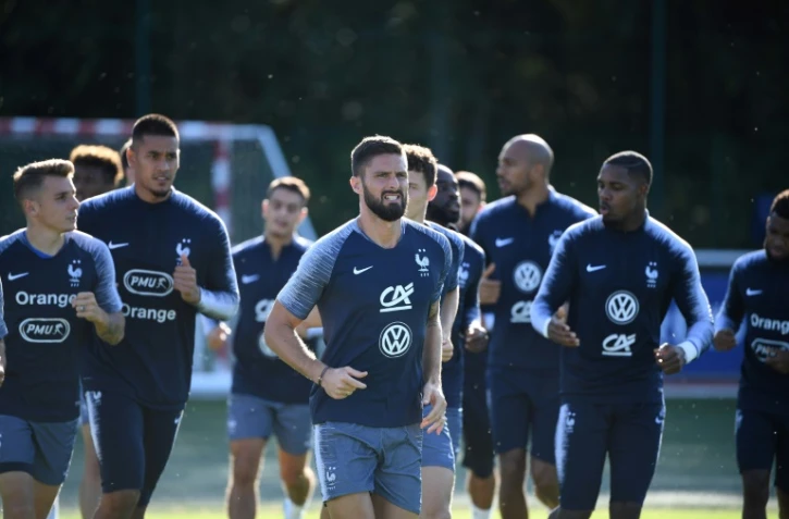 Olivier Giroud (c) et ses coéquipiers à l'entraînement à Clairefontaine, le 3 septembre 2019
