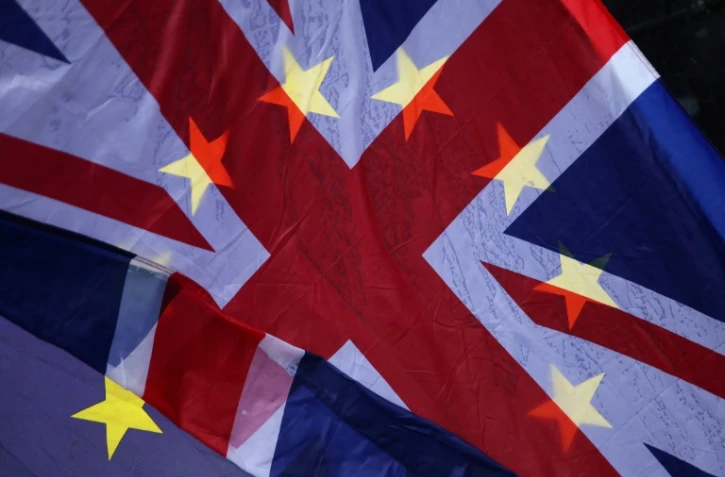 Drapeaux britannique et européen lors d'une manifestation anti-Brexit, le 29 mars 2018 à Londres.