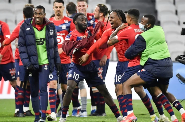 La joie des joueurs de Lille après leur victoire sur Lyon lors du match de Ligue 1 à Décines-Charpieu, le 25 avril 2021