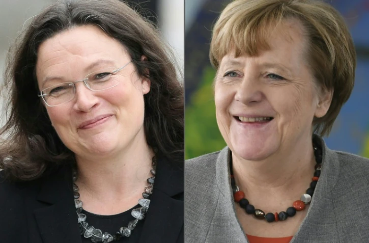 Un photomontage fait le 14 février 2018 de portraits d'Andrea Nahles qui va être élue présidente du parti social-démocrate et la chancelière Angela Merkel  