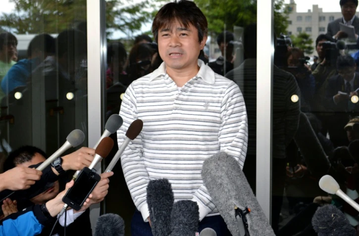 Le père de Yamato Tanooka, un garçonnet de 7 ans abandonné dans une forêt au Japon, parle aux reporters à Hakodate le 3 juin 2016