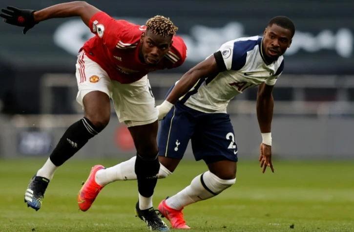 Paul Pogba le milieu de Manchester United (en rouge) dans le stade de Tottenham à Londres le 11 avril 2021.