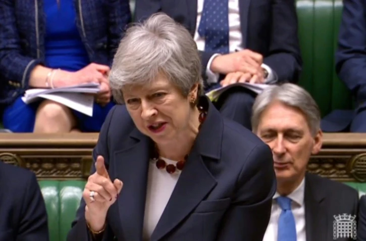 La Première ministre Theresa May s'exprime lors de la séance des questions au parlement à Londres le 27 mars 2019