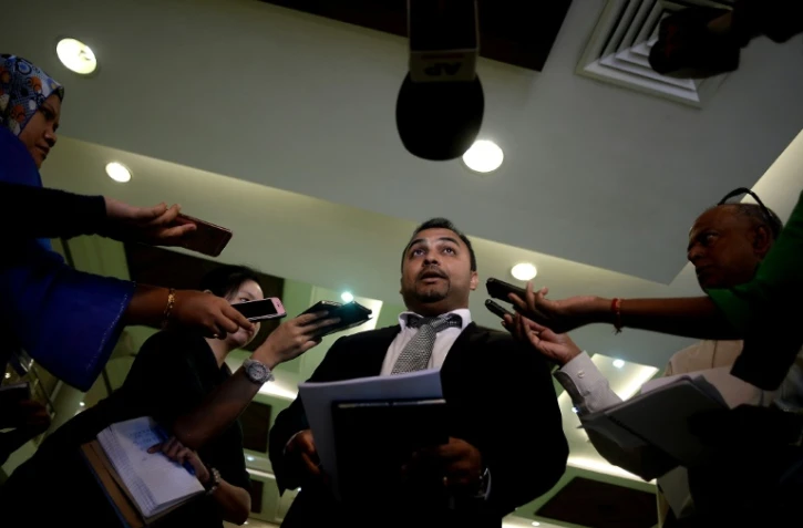 Balan Nair, l'avocat des familles des membres de l'équipage du vol MH17 de Malaysian Airlines répond aux journalistes, le 2 juin 2016 à Kuala Lumpur