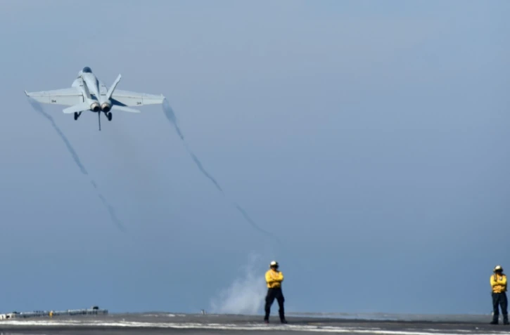 Un F-18 catapulté depuis le porte-avion américain USS Bush dans l'océan Atlantique au large de la Côte est des Etats-Unis, le 11 mai 2018