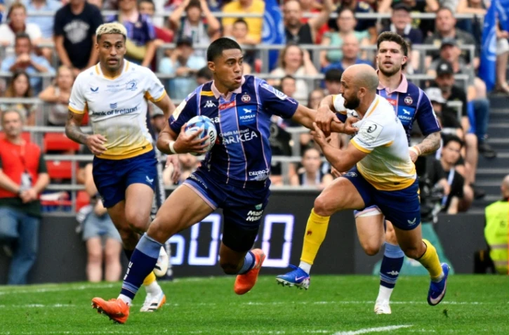 L'arrière néo-zélandais de l'Union Bordeaux-Bègles back #15 Salesi Rayasi (C) lors de la victoire contre le Leinster en finale de la Champions Cup de rugby, le 23 mai
