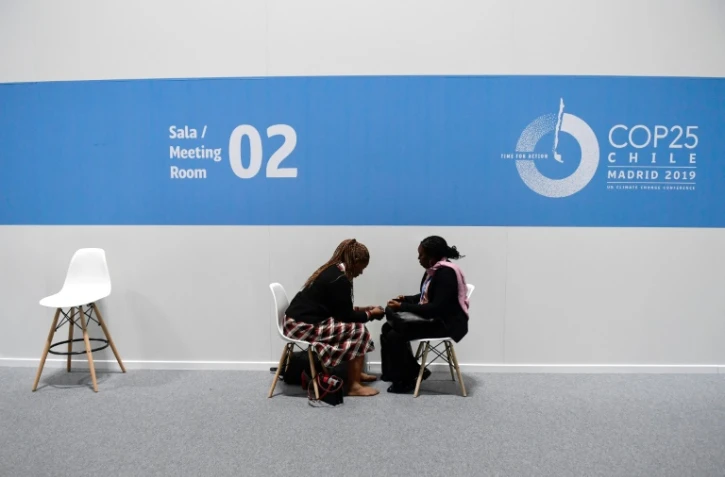 Des participants à la COP25 sur le changement climatique jeudi 12 décembre à Madrid
