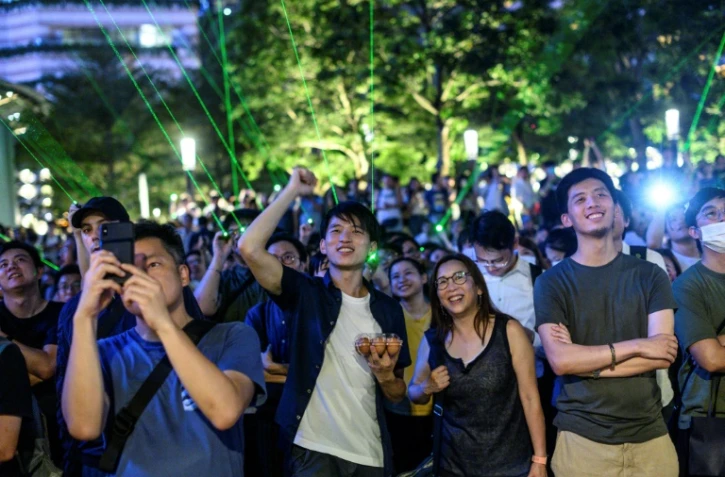 Des manifestants rassemblés pour un "spectacle laser", le 7 août 2019 à Hong Kong