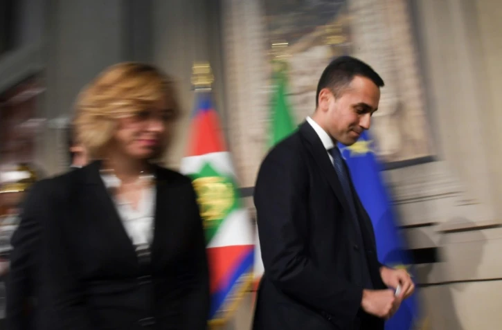 Le leader du M5S Luigi di Maio (à droite) et la présidente du groupe M5S au Parlement Giulia Grillo quittent une réunion avec le président italien Sergio Mattarella, le 14 mai 2018 à Rome