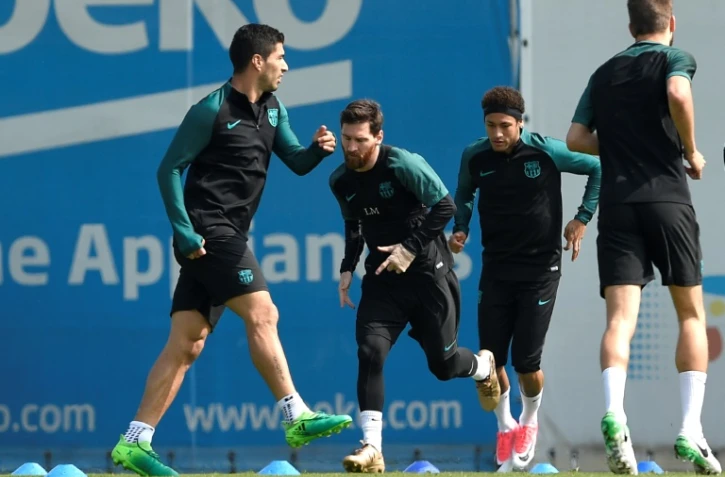 Luis Suarez, Lionel Messi, Neymar et Gerard Pique, à l'entraînement avec le Barça, le 18 avril 2017 au centre Joan Gamper