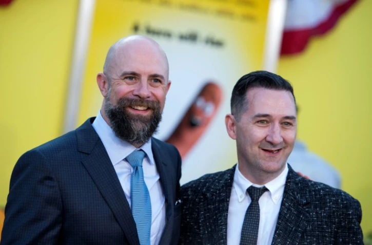 Les réalisateurs américains Conrad Vernon (G) et Greg Tiernan à la première de leur film "Sausage party" à Westwood en Californie, le 9 août 2016