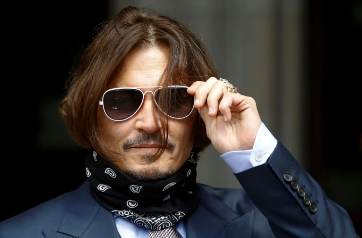 Johnny Depp arrive au tribunal de Londres le 17 juillet 2020 pour son procès en diffamation contre le tabloïd britannique The Sun