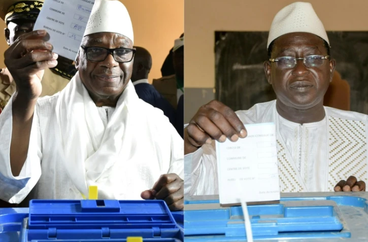 Le président sortant, Ibrahim Boubacar Keïta (gauche) et son adversaire pour le second tour de la présidentielle, Soumaïla Cissé (droite), le 29 juillet 2018. 