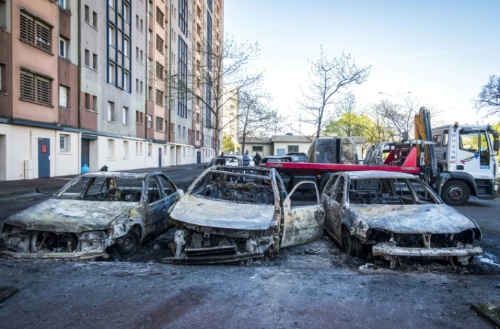 Voitures calcinées sur le parking d'une cité de Bagatelle, à Toulouse, le 17 avril 2018
