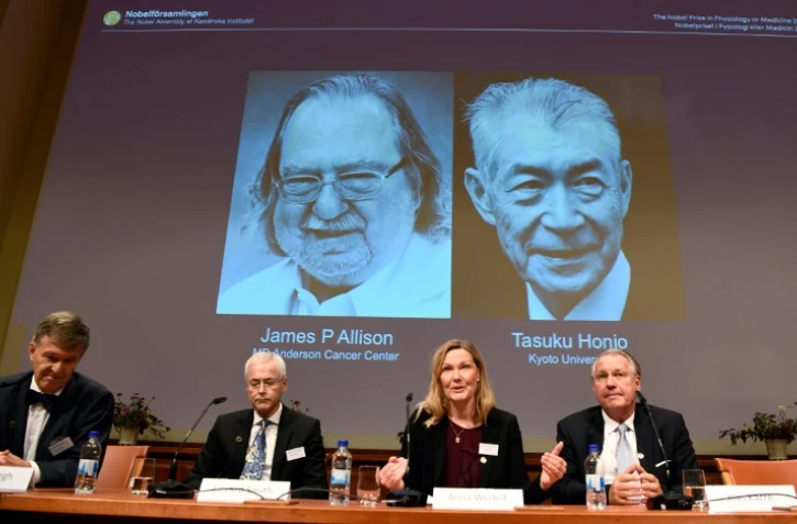Les membres du Comité Nobel annoncent le 1er octobre 2018 à Stockholm les noms des lauréats du Nobel de médecine, l'Américain James P. Allison et le Japonais Tasuku Honjo.