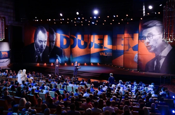 Le Premier ministre social-démocrate suédois Stefan Löfven et le patron des conservateurs, Ulf Kristersson, lors d'un débat télévisé le 8 septembre 2018 à Linkoping