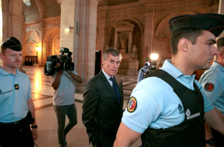L'ex-ministre du Budget Jérôme Cahuzac (c), le 14 septembre 2016 au Palais de Justice de Paris