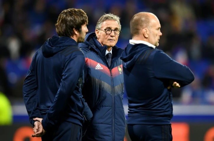 L'encadrement du XV de France: Jean-Frédéric Dubois, Guy Novès et Yannick Bru avant le 2e match face aux All Blacks bis, le 14 novembre 2017 au Parc OL