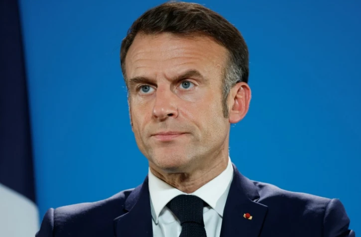 Le président français Emmanuel Macron assiste à une conférence à Bruxelles, le 17 octobre 2024