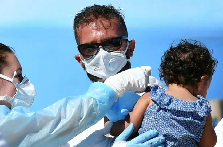 Arrivée de migrants secourus en Méditerranée au port de Lampedusa, le 29 juillet 2020