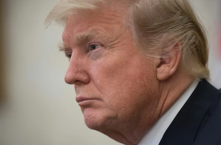 Donald Trump photographié le 31 janvier 2018, a accusé vendredi le FBI et le ministère de la Justice au plus haut niveau de politiser leurs enquêtes