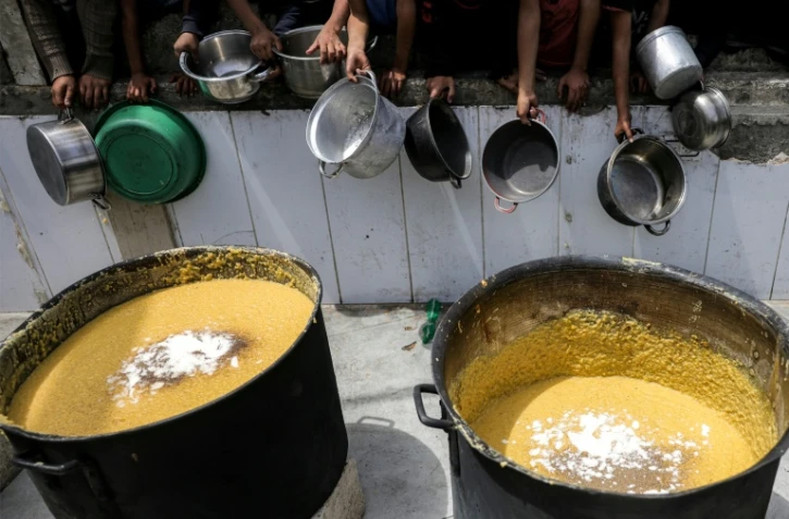 Distribution de nourriture à Beit Lahia, dans le nord de la bande de Gaza, le 24 avril 2025