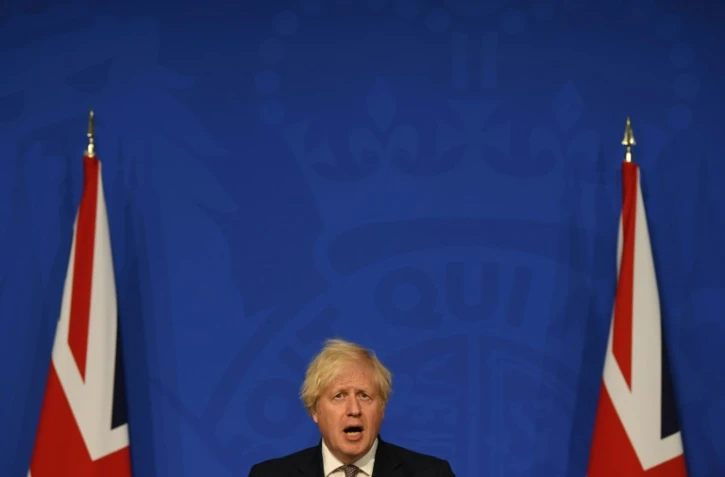 Boris Johnson fait le point sur l'assouplissement des restrictions imposées au pays au 10 Downing Street, à Londres le 5 juillet 2021