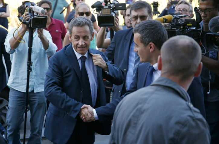 Nicolas Sarkozy arrive à son nouveau QG de campagne à Paris le 23 août 2016