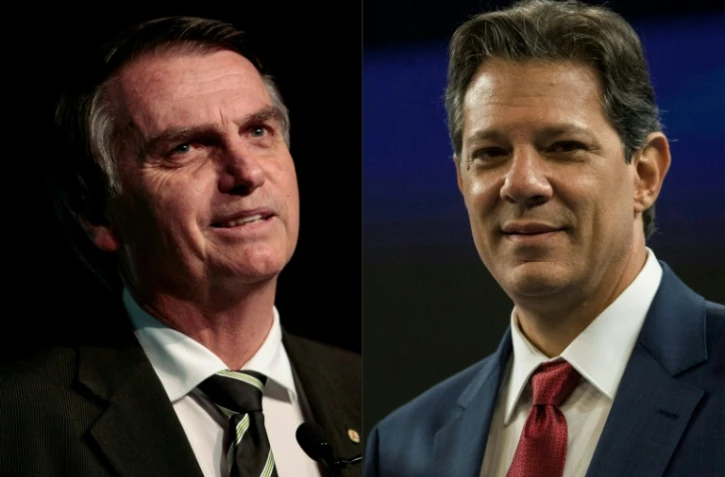 Ce montage réalisé le 8 octobre 2018 montre les deux candidats au lice au second tour de la présidentielle brésilienne: Jair Bolsonaro (à gauche) et Fernando Haddad (à droite)