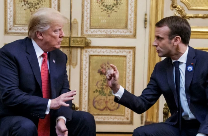 Donald Trump (à gauche) en compagnie du président français Emmanuel Macron, à l'Elysée, le 10 novembre 2018