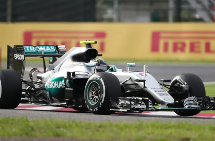 L'Allemand Nico Rosberg au volant de sa Mercedes lors des essais qualificatifs pour le GP du Japon sur le circuit de Suzuka, le 8 octobre 2016
