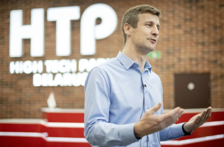 Andreï Dorine, chef de projet chez Qulix, une entreprise de développement informatique, lors d'une interview avec l'AFP à Minsk, le 27 janvier 2025 au Bélarus 
