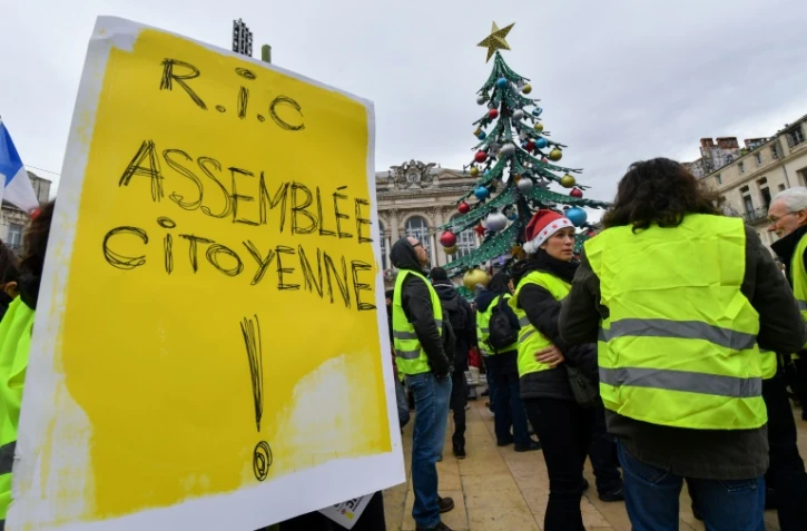 Un manifestant appelle à un RIC (référendum d'initiative citoyenne), à Montpellier, le 15 décembre 2018