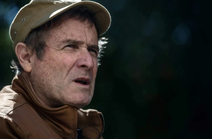 Le chanteur sud-africain Johnny Clegg répond aux questions de l'AFP le 22 juin 2017 à Johannesburg 