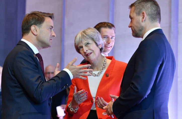 Les Premiers ministres luxembourgeois Xavier Bettel, britannique Theresa May et slovaque Peter Pellegrini lors du sommet de l'UE à Salzbourg, le 20 septembre 2018