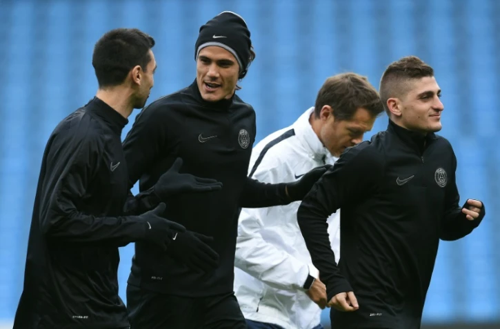 Les joueurs du PSG Javier Pastore (g), Edinson Cavani (c) et Marco Verratti, lors d'un entraînement, le 11 avril 2016 à l'Etihad Stadium de Manchester City