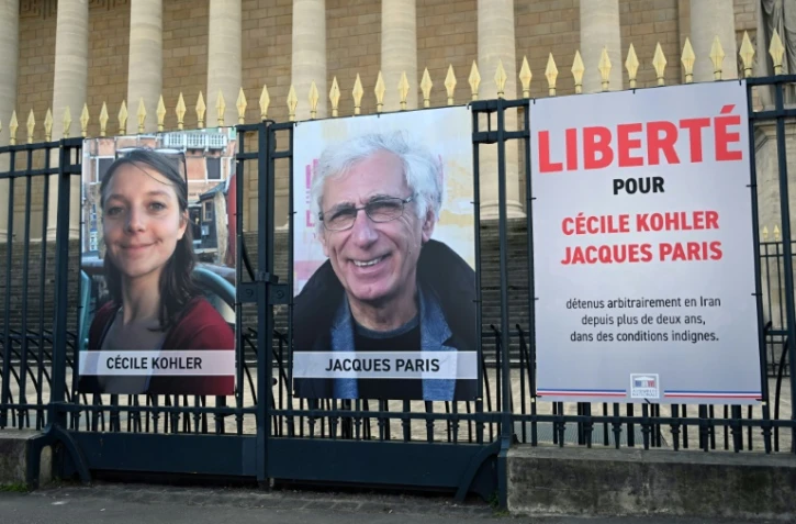 Les portraits de Cécile Kohler et Jacques Paris devant l'Assemblée nationale à Paris, le 25 mars 2025