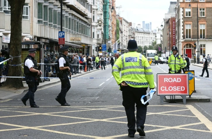Des policiers à Russell Square, théâtre de l'attaque au couteau qui a coûté la vie à une Américaine, le 4 août 2016 