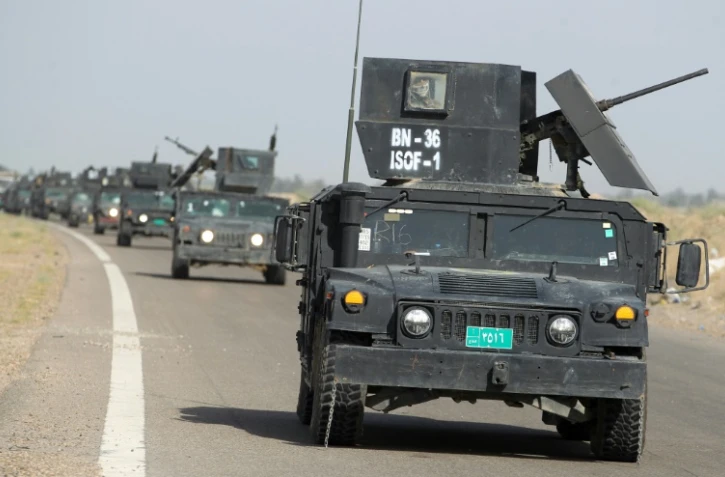 Les forces du contre-terrorisme irakiennes se dirigent le 28 mai 2016 vers al-Sejar près de Fallouja