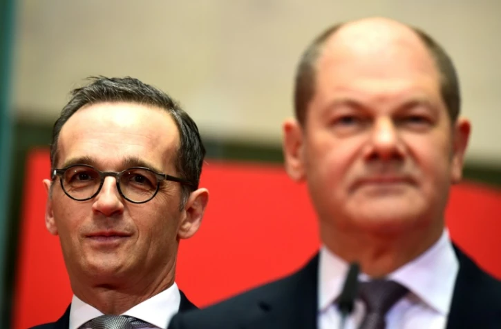 Olaf Scholz (d) désigné ministre allemand des Finances et Heiko Maas désigné aux Affaires étrangères à Berlin, le 9 mars 2018 