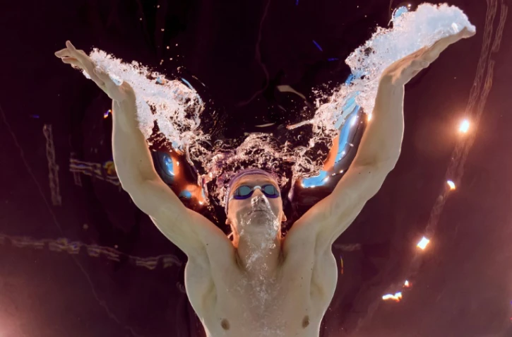 Le Français Léon Marchand sur 200 m papillon lors des JO, le 30 juillet 2024 à Nanterre