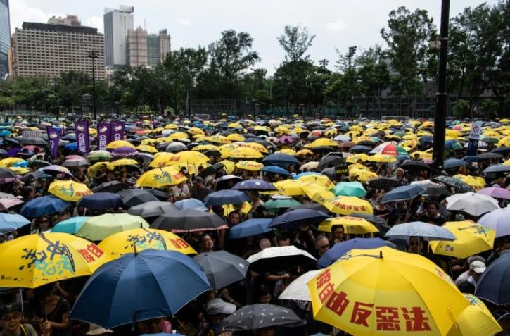 Des manifestants anti-gouvernementaux Ă Hong Kong le 21 juillet 2019