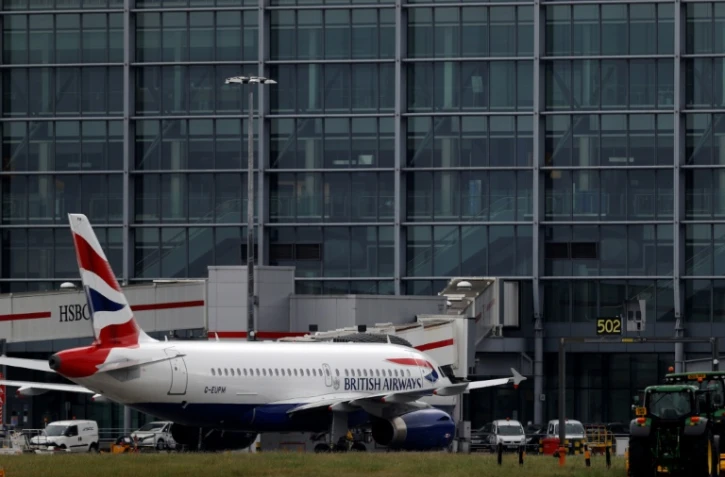 Un Airbus de British Airways stationné sur le tarmac de l'aéroport de Heathrow, (banlieue de Londres), le 10 mai 2020
