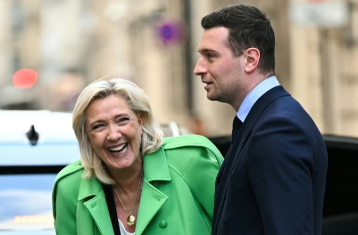 La présidente du groupe RN à l'Assemblée nationale Marine Le Pen et le président du parti Jordan Bardella, à Paris le 11 mars 2026