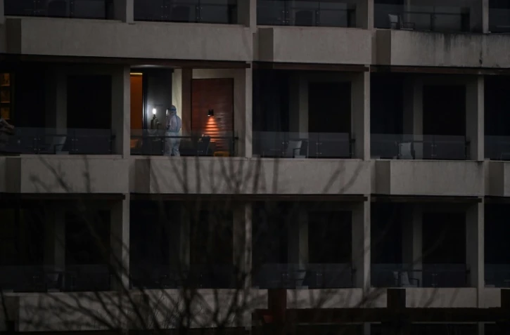 Prises d'échantillons dans un hôtel de Wuhan, en Chine, par des experts de l'OMS qui enquêtent sur l'origine du coronavirus, le 6 février 2021